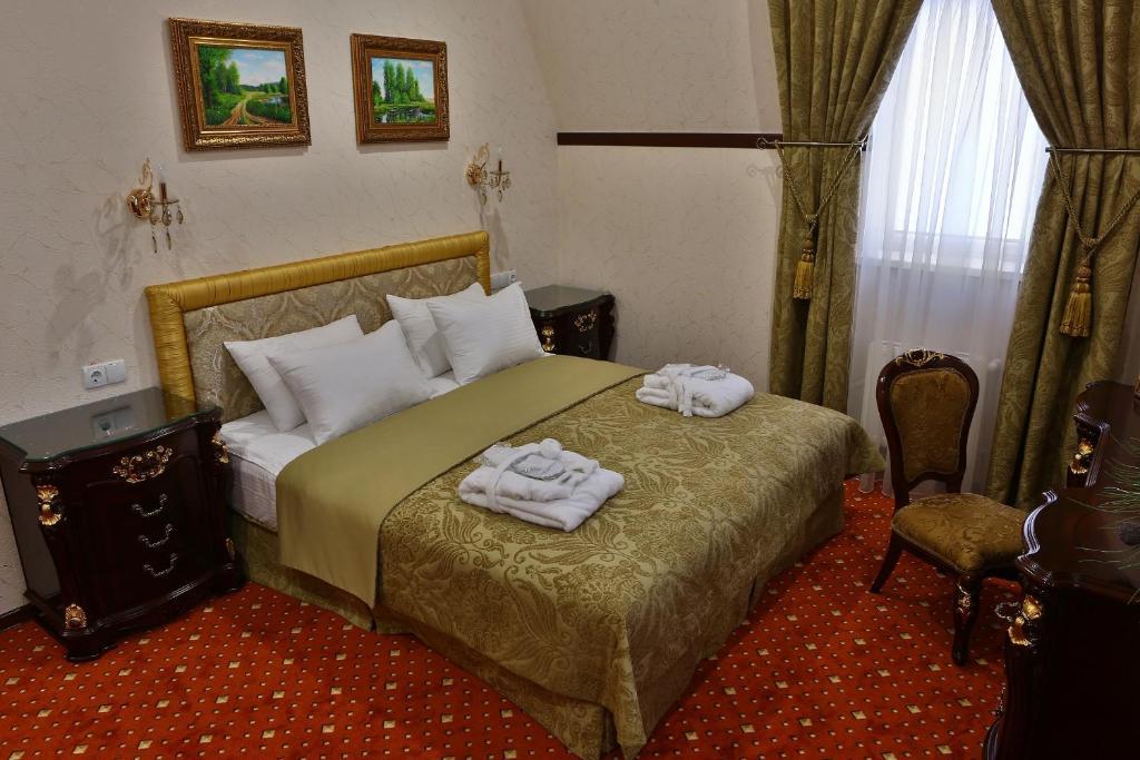 Hotel Ukraine Rivne Quarto foto